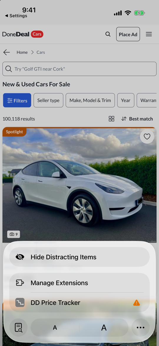 Safari's page menu open over DoneDeal, listing Hide Distracting Items, Manage Extensions and DD Price Tracker, with an orange warning triangle beside DD Price Tracker because it has not been allowed on the site yet